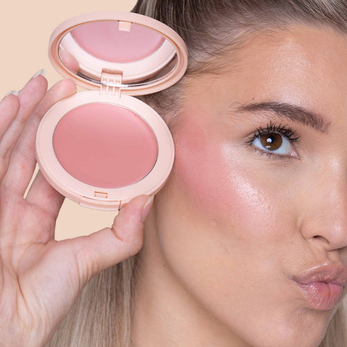 Use a dense brush, beauty sponge or your fingertips to dab onto the apples of your cheeks and blend. For best results, apply Glow Milk pressed powder blush to set and emphasise your glow!