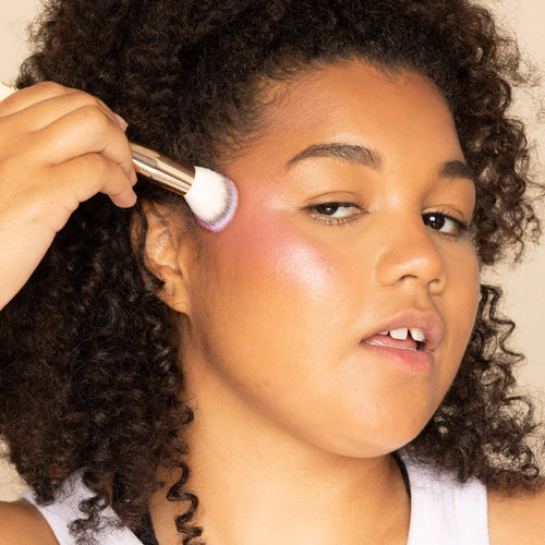 With a soft blush brush, lightly sweep powder and apply to the apple of cheeks. Build up as desired.
Pro tip: For glowing results, apply on top of Glow Milk Blushed Cream Blush to set and emphasise your look!